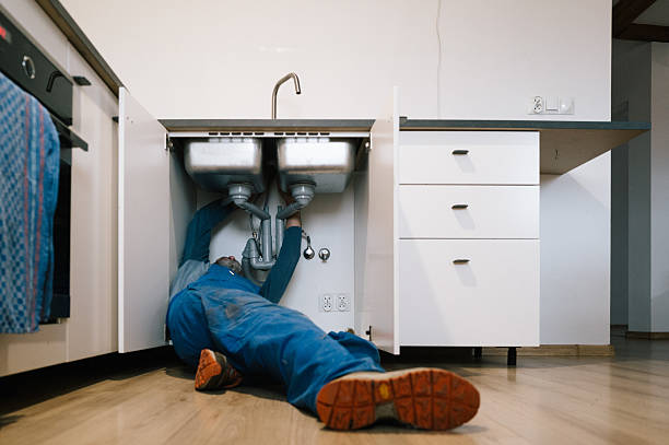 Professional Emergency Plumber technician working in Holbrook, NY